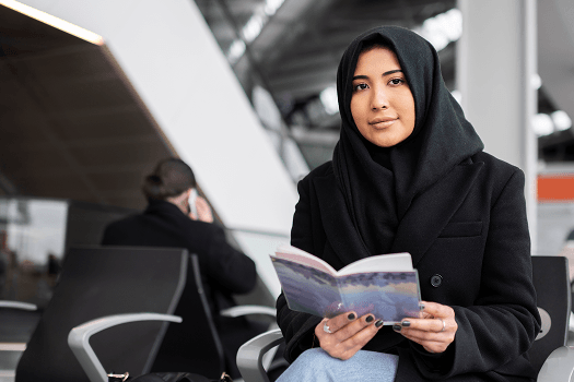A girl reading book outdoor